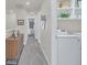 Laundry room with washer, dryer, and overhead shelving at 2102 Gopher Tortoise Ter, Oakland, FL 34787