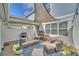 Outdoor patio with seating area and shade structure at 2102 Gopher Tortoise Ter, Oakland, FL 34787