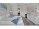 Spacious main bedroom with large bed and ensuite bathroom access at 219 Blue Cypress Dr, Groveland, FL 34736