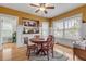 Charming dining area with a round table and a sunny window seat at 220 Riverview Blvd, Daytona Beach, FL 32118