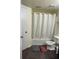 Clean bathroom with a bathtub and shower at 2216 Grand Cayman Ct # 1411, Kissimmee, FL 34741