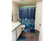 Clean bathroom with shower/tub combo at 2216 Grand Cayman Ct # 1411, Kissimmee, FL 34741