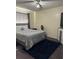 Main bedroom with a queen-size bed and ceiling fan at 2216 Grand Cayman Ct # 1411, Kissimmee, FL 34741