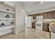 Efficient kitchen layout with ample cabinet space and modern white appliances at 233 Bluejay Way, Orlando, FL 32828