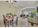 Bright and airy living room seamlessly connected to the dining space at 233 Bluejay Way, Orlando, FL 32828