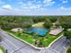 Aerial view of tennis courts, playground, and roads at 282 S Fox Chase Pt, Longwood, FL 32779