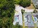 Aerial perspective of two homes with pools at 3211 Sunrise Walk, Kissimmee, FL 34747