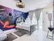 Star Wars themed bedroom with a full-size bed and mural at 3211 Sunrise Walk, Kissimmee, FL 34747