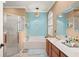 Bathroom with a large soaking tub, double vanity, and a separate shower at 33925 Terragona Dr, Sorrento, FL 32776