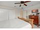 Main bedroom with wood furniture and large closet at 33925 Terragona Dr, Sorrento, FL 32776