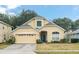 Beautiful two-story house with a two-car garage at 33925 Terragona Dr, Sorrento, FL 32776