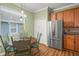 Bright kitchen nook with a small table and chairs, stainless steel refrigerator at 33925 Terragona Dr, Sorrento, FL 32776