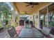 Outdoor patio with seating area and grill at 33925 Terragona Dr, Sorrento, FL 32776