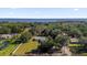 Aerial view showcasing home's waterfront location at 38100 Ricker Dr, Lady Lake, FL 32159