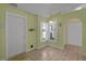 Cozy kitchen with light-colored cabinets and tiled floor at 38100 Ricker Dr, Lady Lake, FL 32159