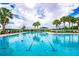 Community lap pool with ample lounging areas at 3840 Eversholt St, Clermont, FL 34711