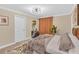 King bedroom with a cozy atmosphere and stylish decor at 4299 Paragraph Dr, Kissimmee, FL 34746