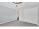 Bright bedroom with ceiling fan and spacious closet at 4382 Weeping Willow Cir, Casselberry, FL 32707