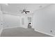 Large bedroom with ceiling fan and access to laundry at 4382 Weeping Willow Cir, Casselberry, FL 32707