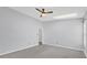 Spacious bedroom with ceiling fan and skylight at 4382 Weeping Willow Cir, Casselberry, FL 32707