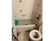 Bathroom with tub and toilet, needs cleaning at 5238 Macadamia Ct, Orlando, FL 32818