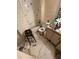 Bathroom with tub, toilet and sink, cluttered at 5238 Macadamia Ct, Orlando, FL 32818