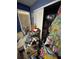 Bedroom with closet and window, cluttered at 5238 Macadamia Ct, Orlando, FL 32818