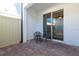 Private patio with brick pavers and seating area at 5814 Bimini Twist Loop, Orlando, FL 32819