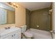 Bathroom with shower/tub combo and vanity at 5896 Peregrine Ave # C01, Orlando, FL 32819