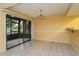 Dining area with view of patio and water at 5896 Peregrine Ave # C01, Orlando, FL 32819