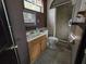 Bathroom showcasing a vanity, toilet, and shower at 6254 Balboa Dr, Orlando, FL 32808