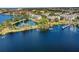 Community features a lake, walking paths, and lush landscaping at 6663 Queens Borough Ave # 108, Orlando, FL 32835