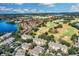 Expansive view of community near lake and golf course at 6663 Queens Borough Ave # 108, Orlando, FL 32835