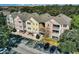 Building exterior showcasing multiple units and parking at 6663 Queens Borough Ave # 108, Orlando, FL 32835