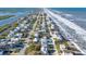 Aerial view of beachfront homes and community at 6912 S Atlantic Ave, New Smyrna Beach, FL 32169