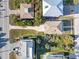 Aerial view of a beach home and surrounding properties at 6912 S Atlantic Ave, New Smyrna Beach, FL 32169