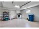 Clean basement featuring laundry area, storage, and bright lighting, offering a functional space at 6912 S Atlantic Ave, New Smyrna Beach, FL 32169