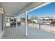 Expansive deck provides plenty of space to relax and enjoy the view at 6912 S Atlantic Ave, New Smyrna Beach, FL 32169