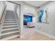 Inviting entryway showcasing hardwood floors leading into a bright living area at 6912 S Atlantic Ave, New Smyrna Beach, FL 32169