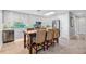 Bright kitchen features stainless steel appliances, lots of natural light, and eating space at 6912 S Atlantic Ave, New Smyrna Beach, FL 32169