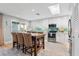 Bright kitchen features stainless steel appliances, lots of natural light, and eating space at 6912 S Atlantic Ave, New Smyrna Beach, FL 32169