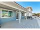 Outdoor deck provides room for dining and enjoying the views at 6912 S Atlantic Ave, New Smyrna Beach, FL 32169