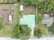 Aerial view showing house, yard, and shed at 817 W 9Th St, Deltona, FL 32725