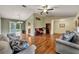 Bright living room with hardwood floors and views to backyard at 817 W 9Th St, Deltona, FL 32725