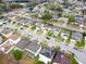 Aerial view of a residential neighborhood with houses and streets at 8747 Isla Bella Dr, Orlando, FL 32818