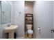 Small bathroom with toilet and sink at 8747 Isla Bella Dr, Orlando, FL 32818