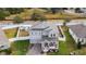 Aerial view of a two-story house with a front porch at 887 Panical Dr, Apopka, FL 32703