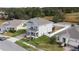 Two-story house aerial view, showcasing curb appeal at 887 Panical Dr, Apopka, FL 32703