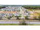 Aerial view of a residential area with a house and backyard at 887 Panical Dr, Apopka, FL 32703