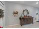 Entryway with console table, mirror, and holiday decor at 887 Panical Dr, Apopka, FL 32703